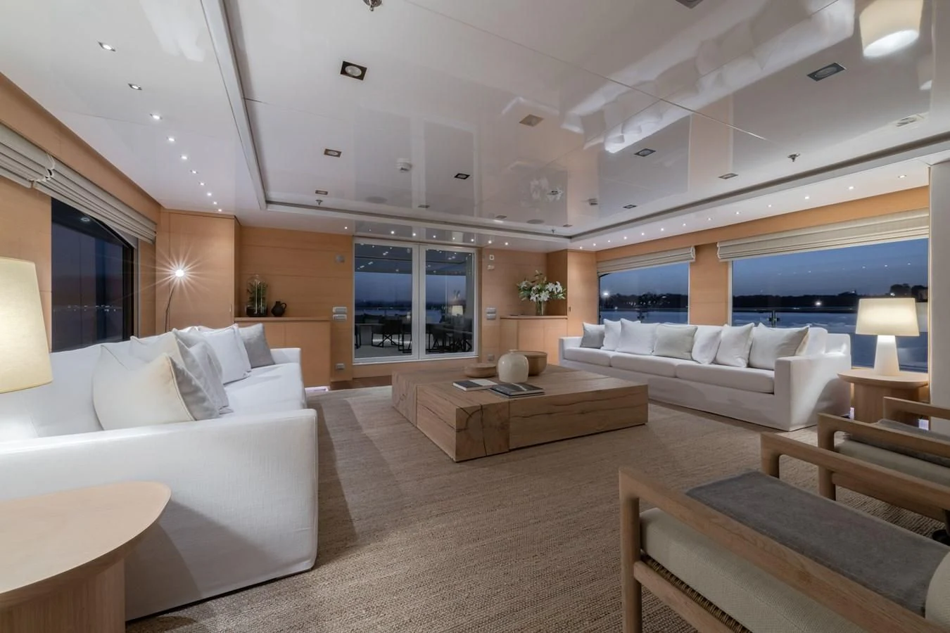 a living room with a couch and a table aboard ZIA Yacht for Sale
