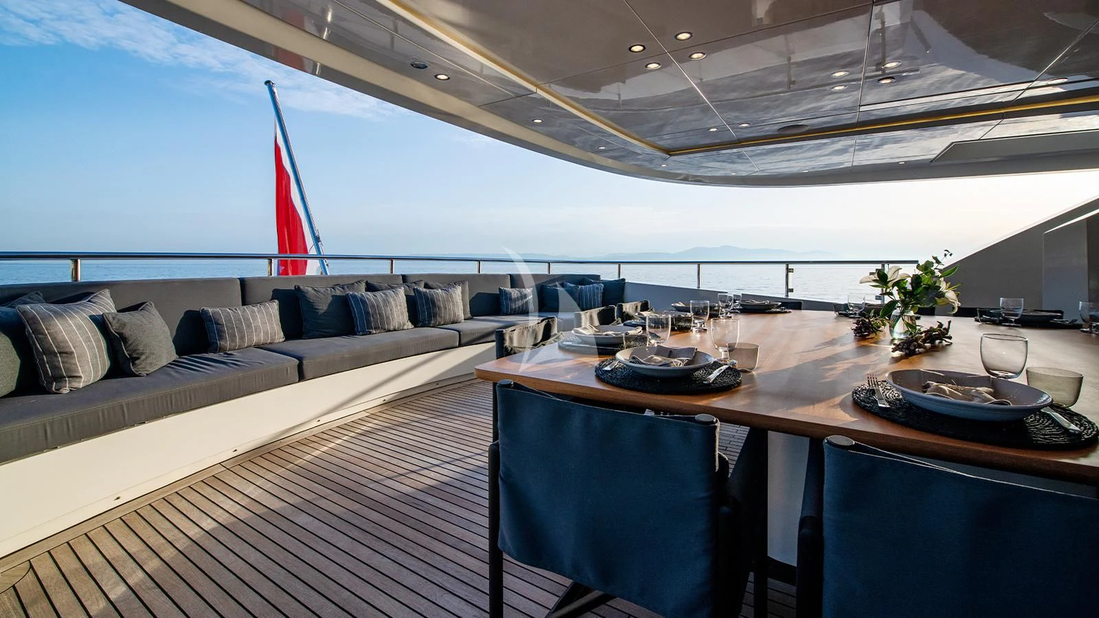 a large room with a couch and a table aboard ZIA Yacht for Sale
