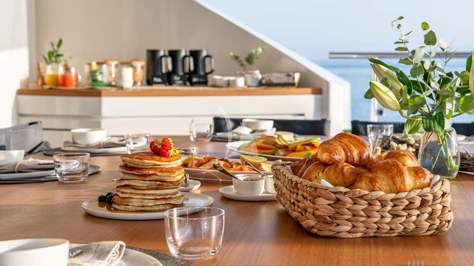 a table with food on it aboard ZIA Yacht for Sale