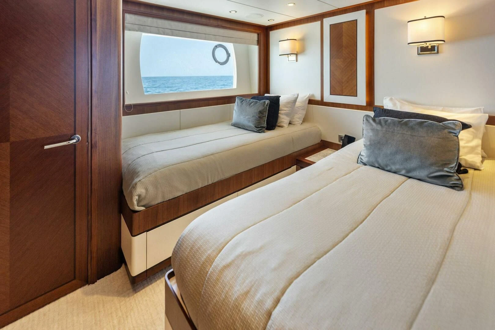 a couple of beds in a room aboard CLAYMAKER Yacht for Sale
