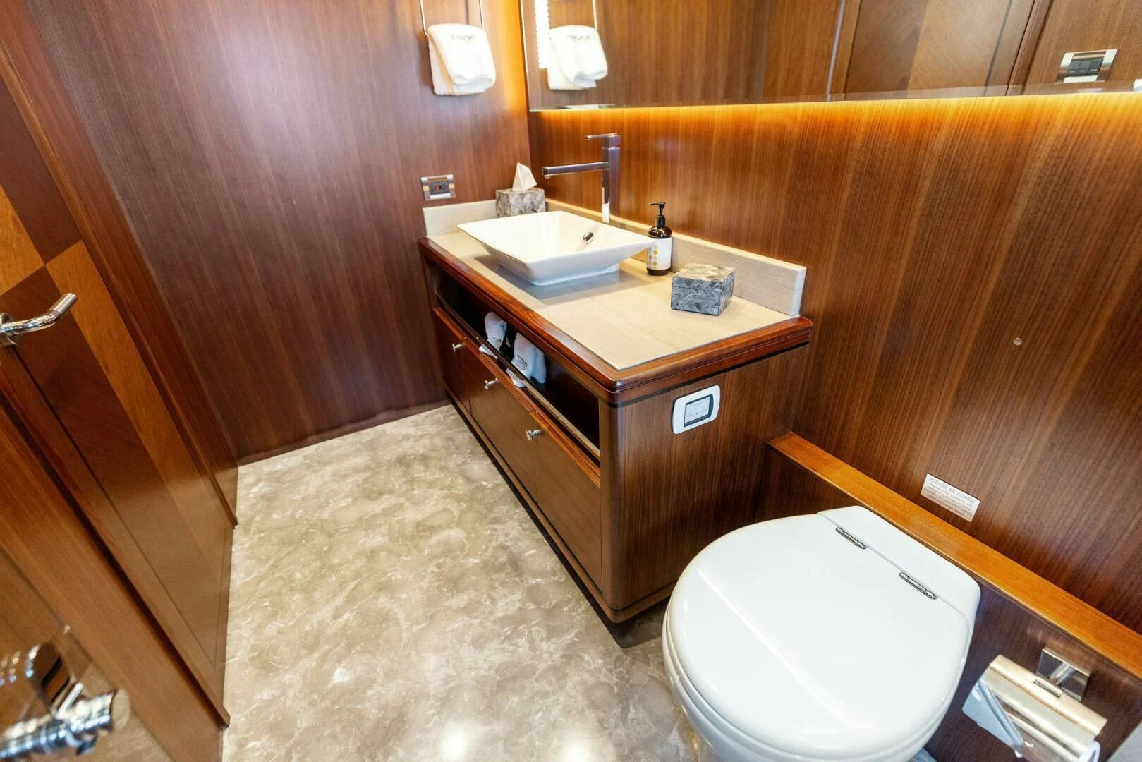 a bathroom with a sink and a toilet aboard CLAYMAKER Yacht for Sale