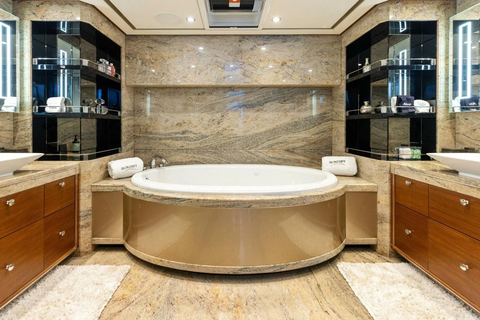 a large bathroom with a large tub aboard CLAYMAKER Yacht for Sale