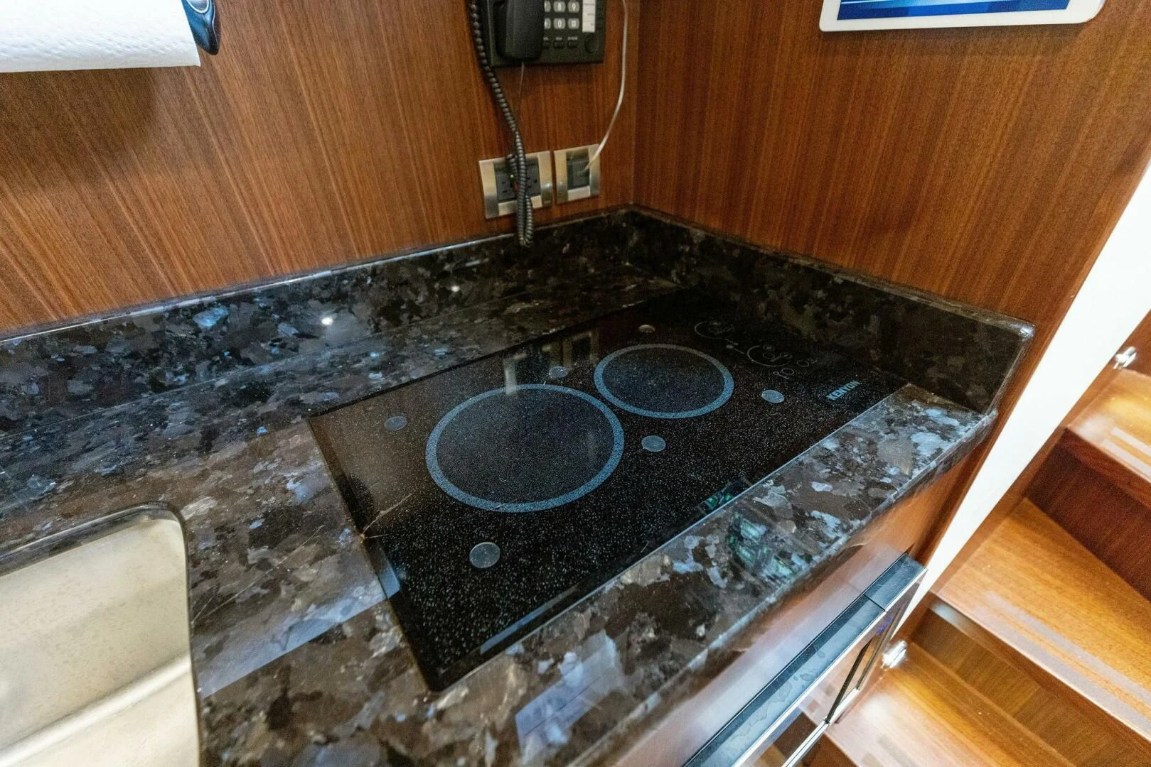 a kitchen counter with a marble top aboard CLAYMAKER Yacht for Sale