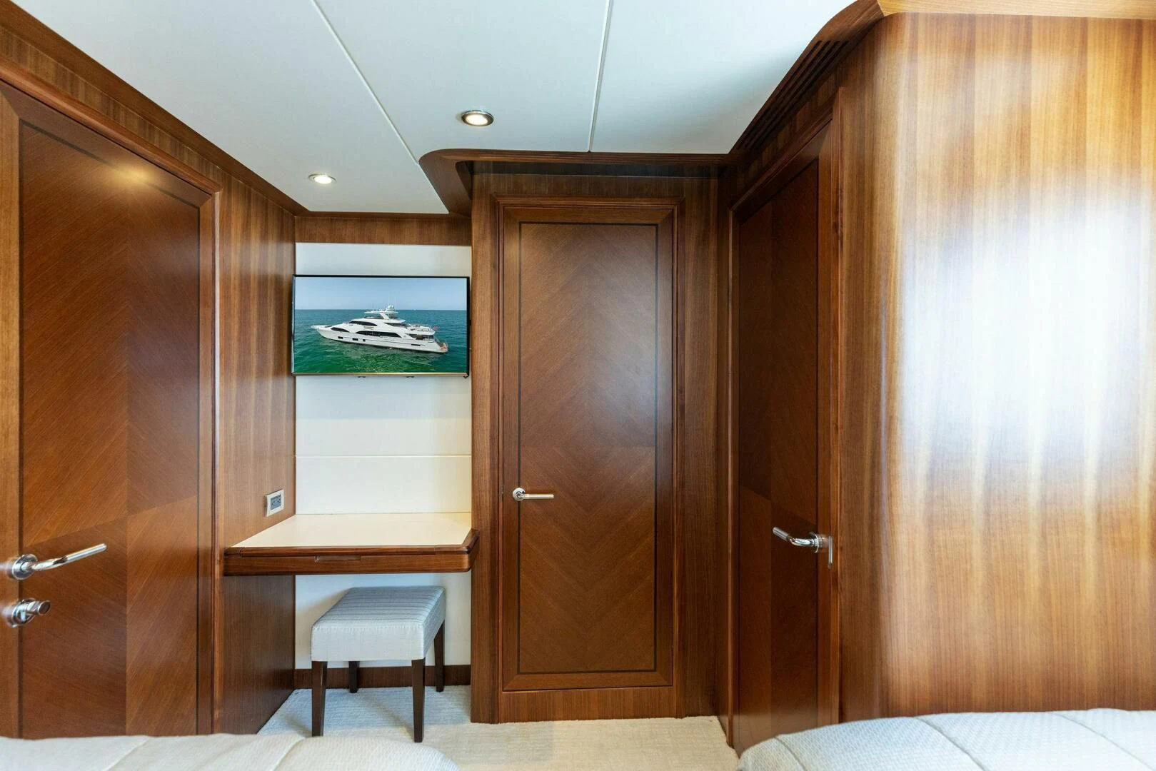 a room with wooden cabinets aboard CLAYMAKER Yacht for Sale