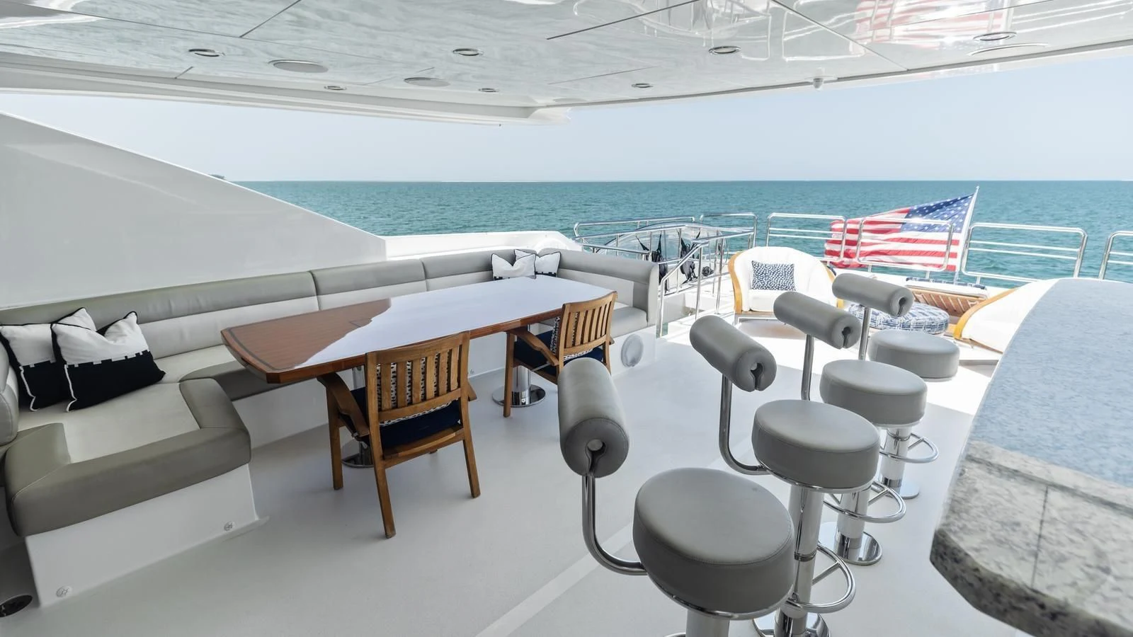 a room with chairs and tables aboard CLAYMAKER Yacht for Sale