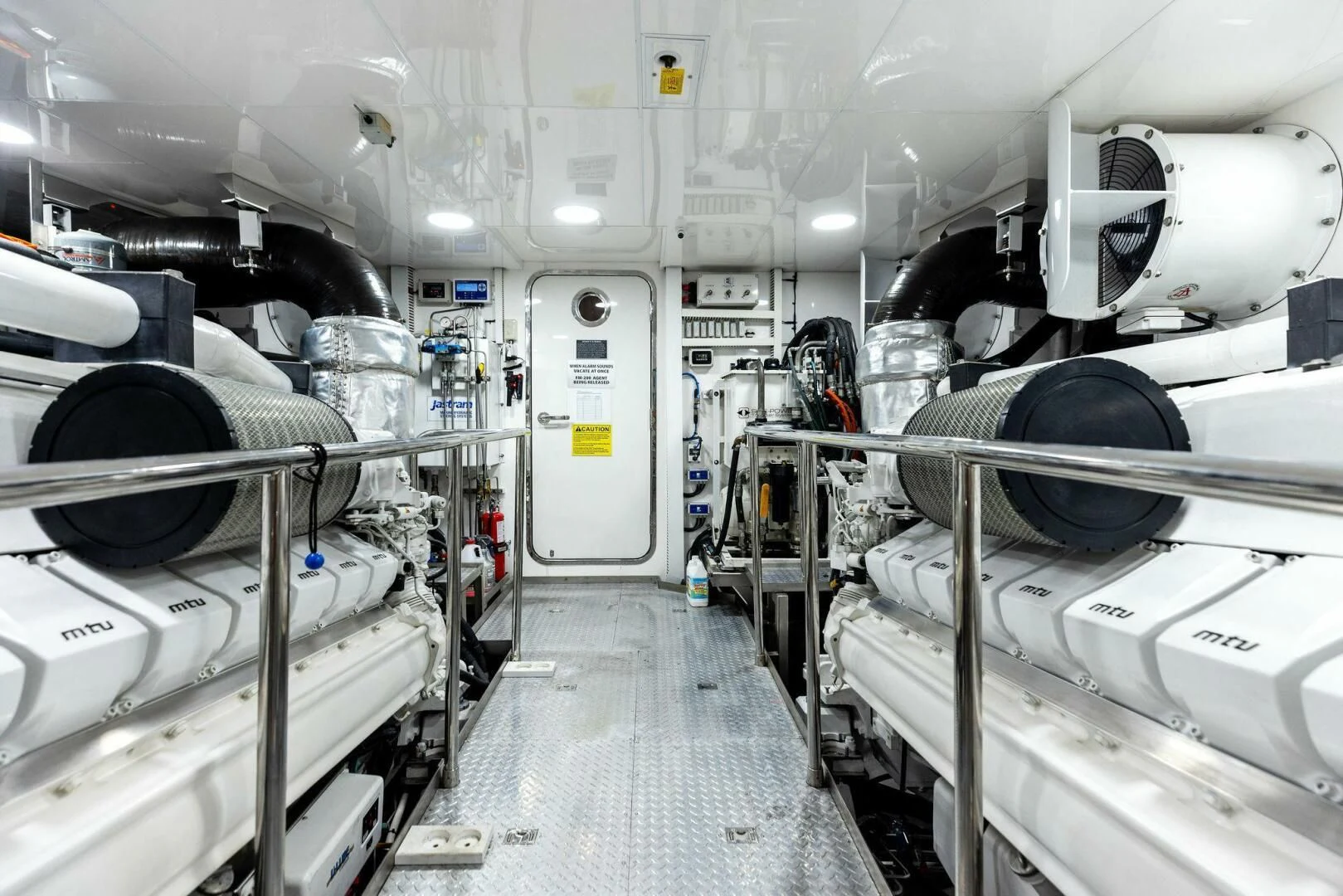 a large room with machines aboard CLAYMAKER Yacht for Sale