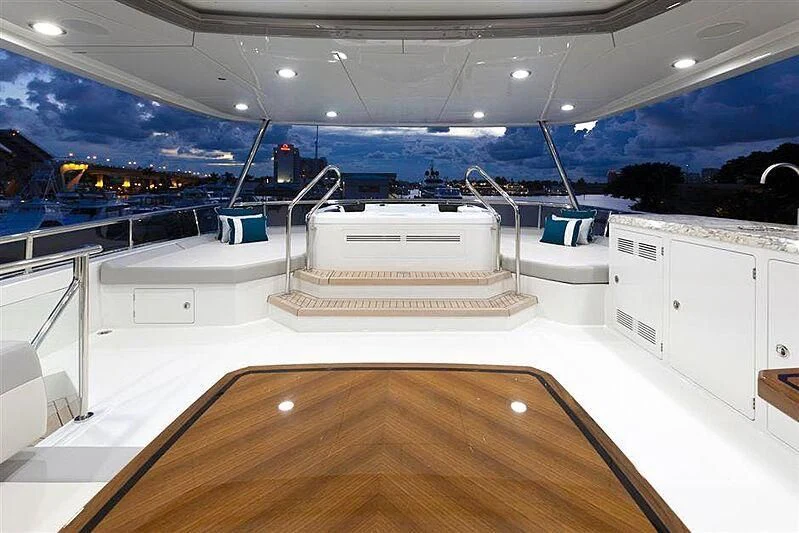 a large room with a large pool aboard CLAYMAKER Yacht for Sale