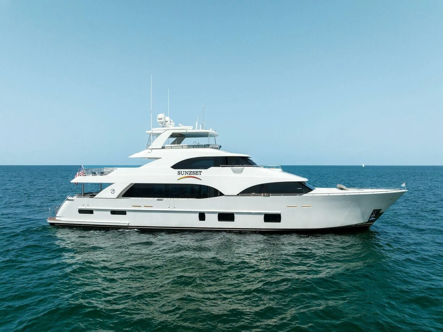 a white yacht in the water aboard CLAYMAKER Yacht for Sale