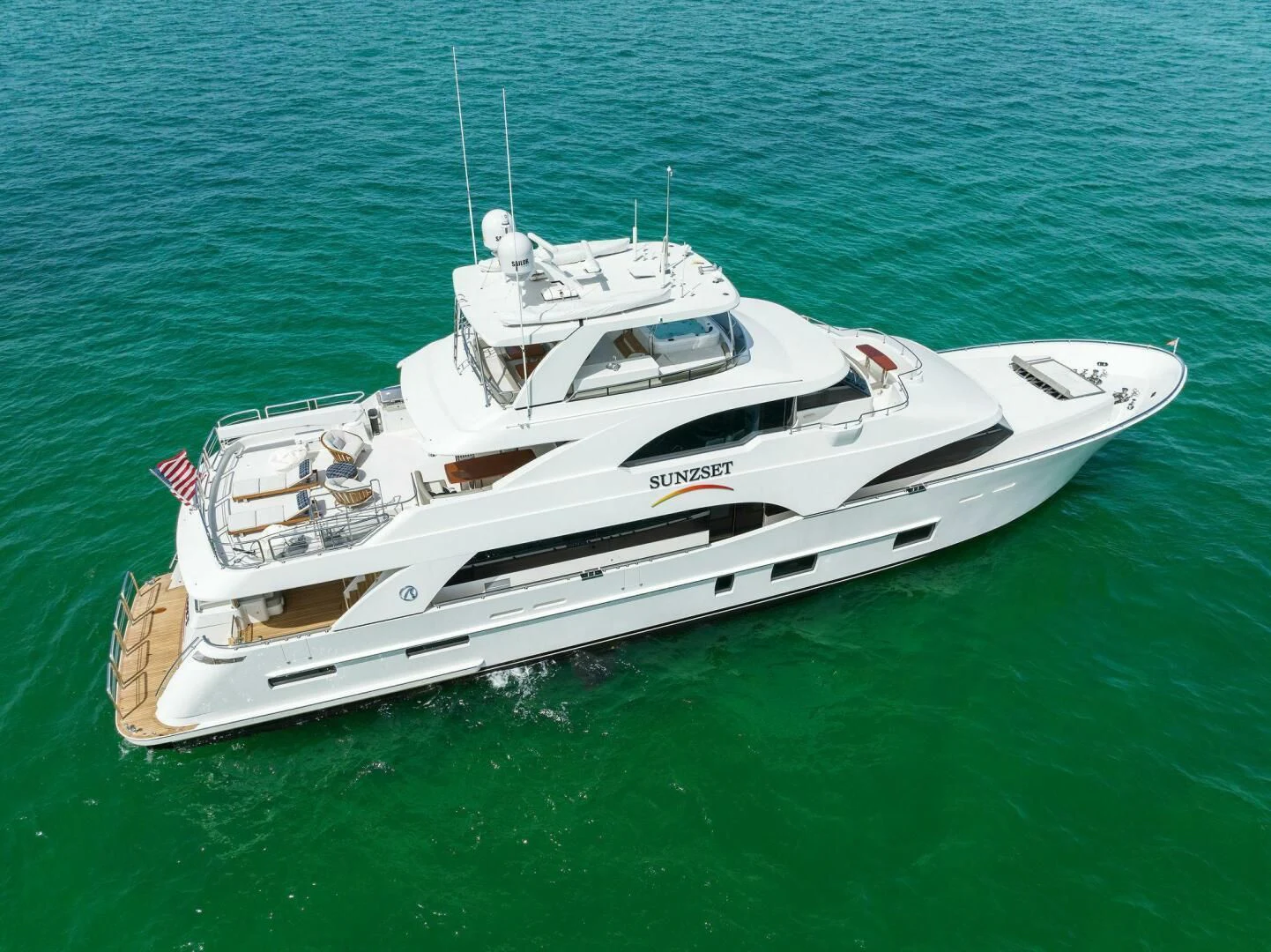 a white boat in the water aboard CLAYMAKER Yacht for Sale