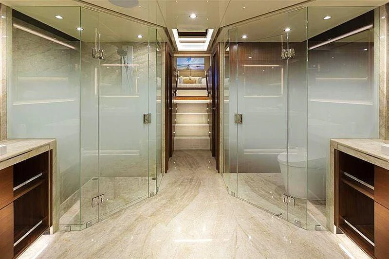 a room with a glass wall and a metal door aboard CLAYMAKER Yacht for Sale