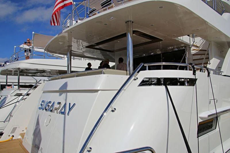 a boat with a white canopy aboard CLAYMAKER Yacht for Sale