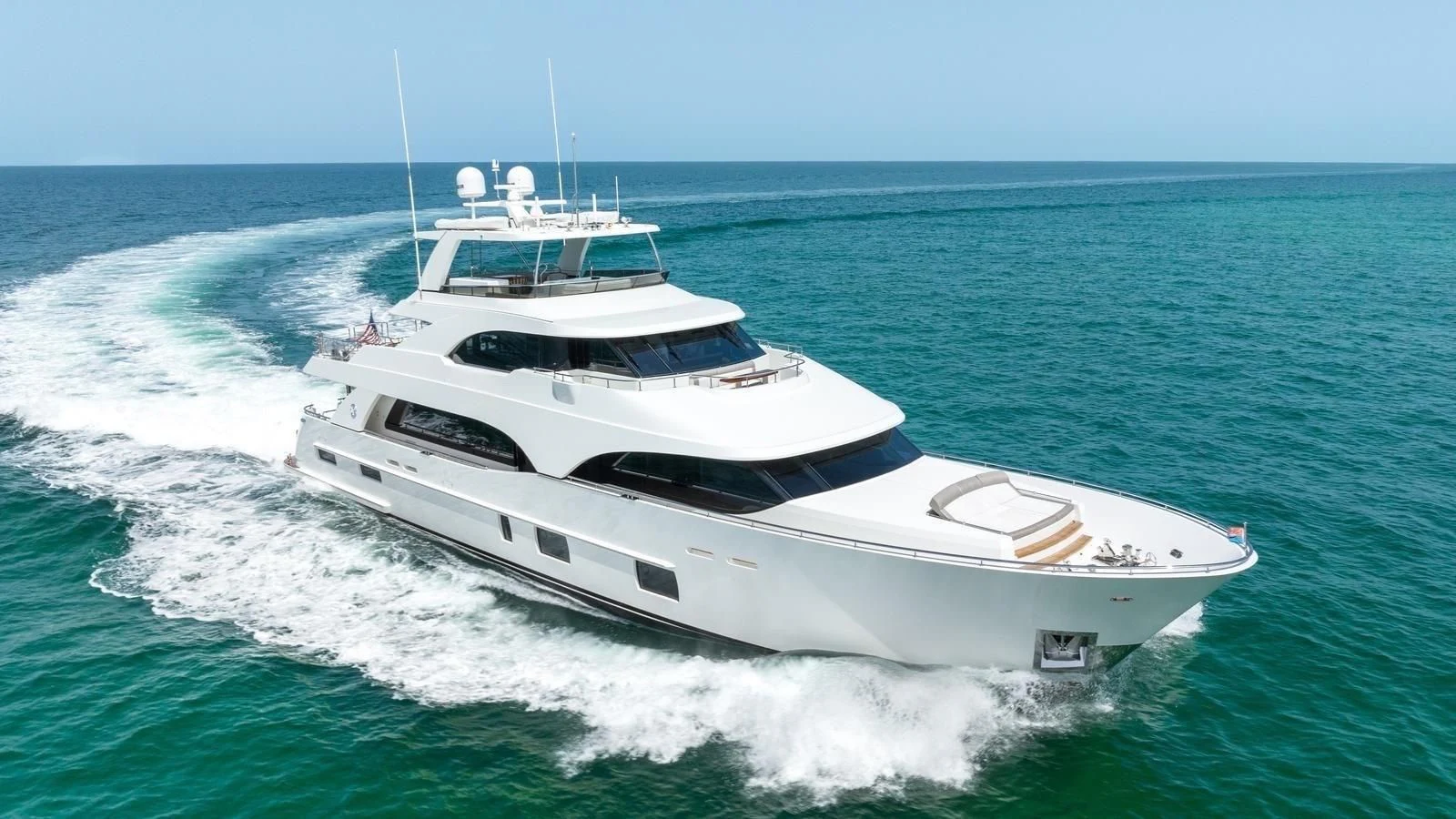 a white yacht on the water aboard CLAYMAKER Yacht for Sale