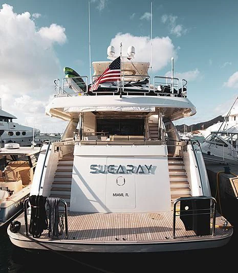a boat with a flag on the front aboard CLAYMAKER Yacht for Sale