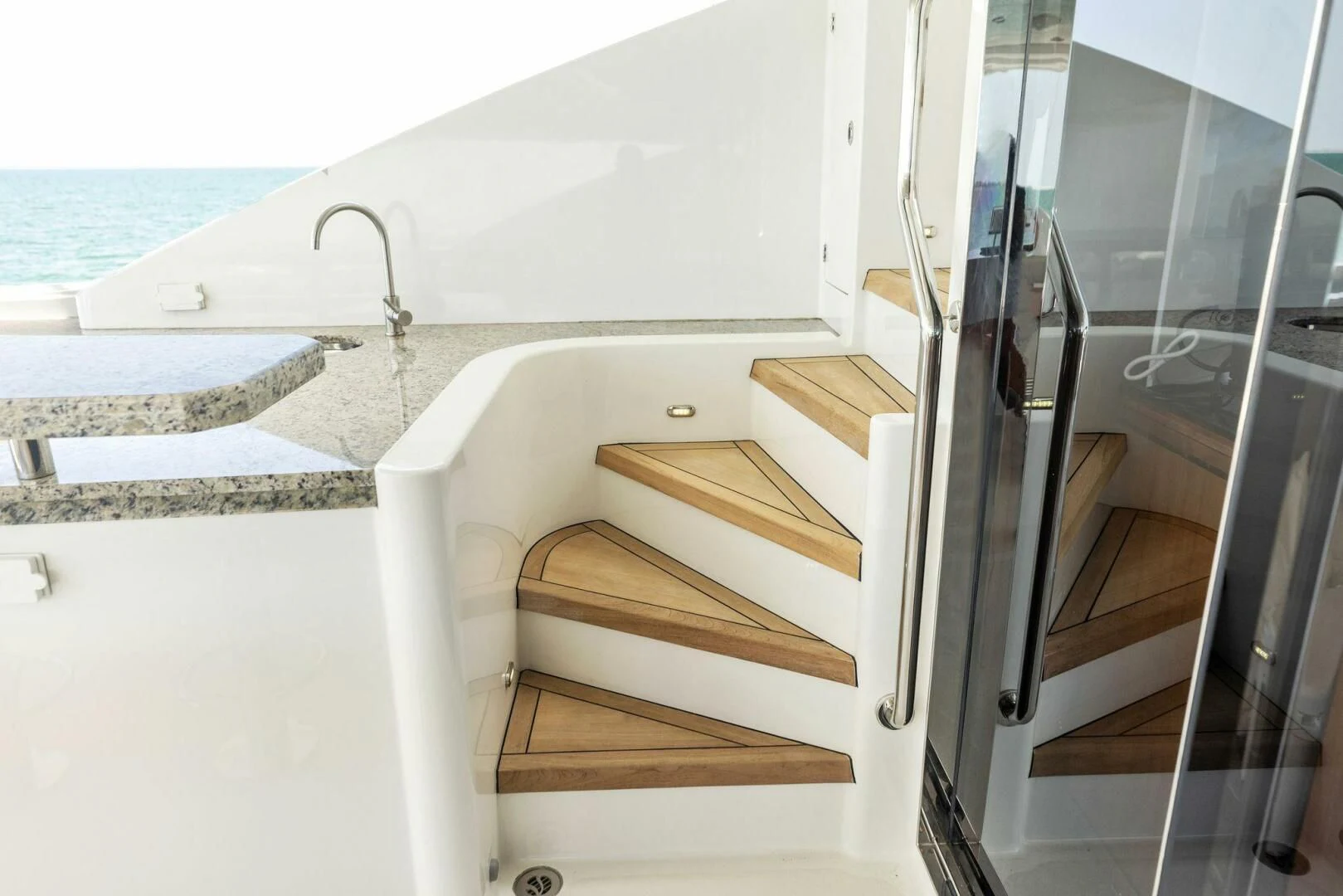 a white bathtub with a sink and a sink aboard CLAYMAKER Yacht for Sale