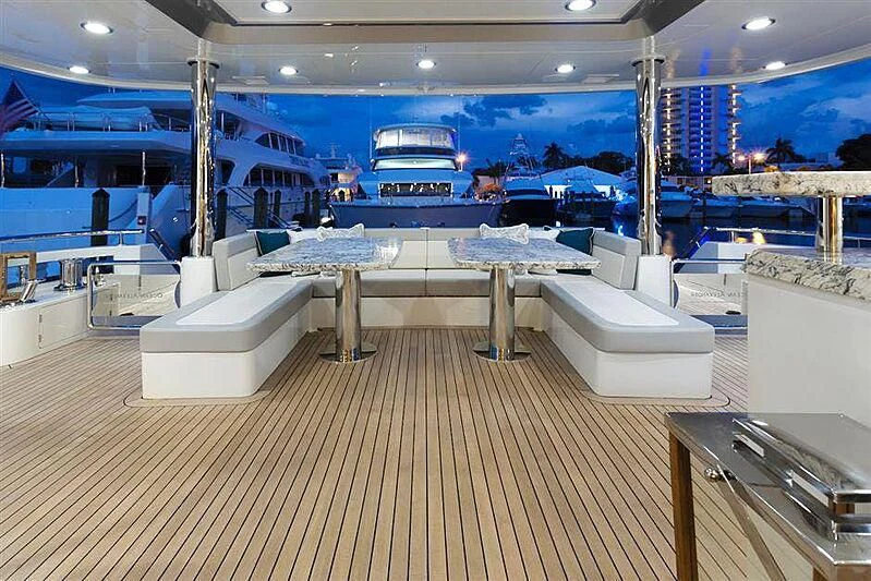 a large room with a large pool aboard CLAYMAKER Yacht for Sale