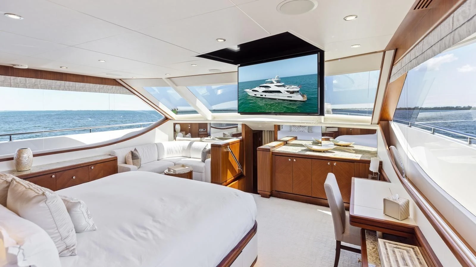 a room with a bed and a television aboard CLAYMAKER Yacht for Sale