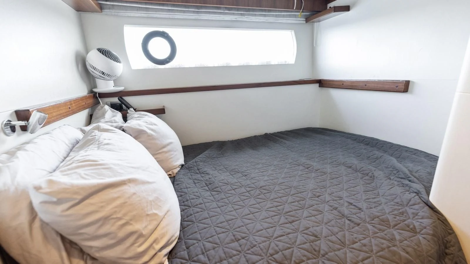 a couple of beds in a room aboard CLAYMAKER Yacht for Sale