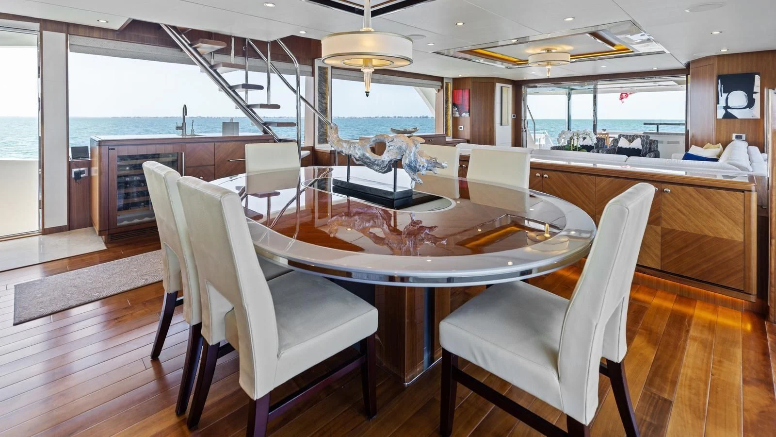 a dining room with a table aboard CLAYMAKER Yacht for Sale