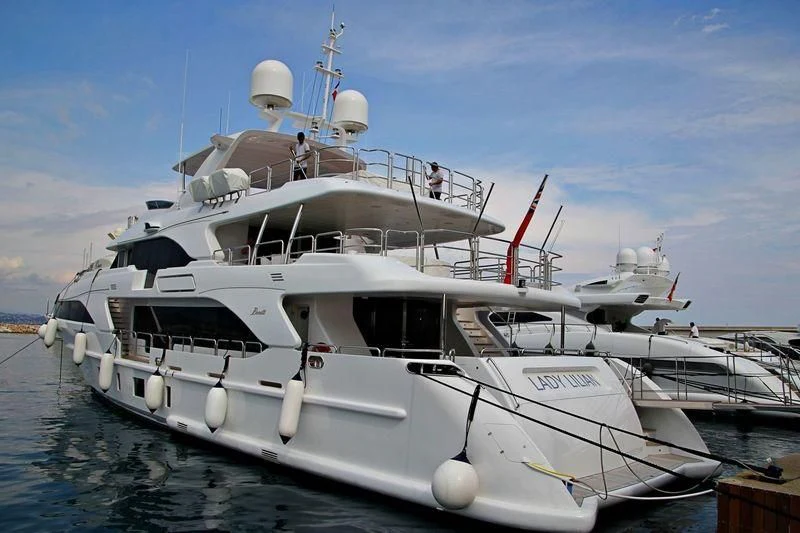 a boat docked at a pier aboard LADY LILIAN Yacht for Sale