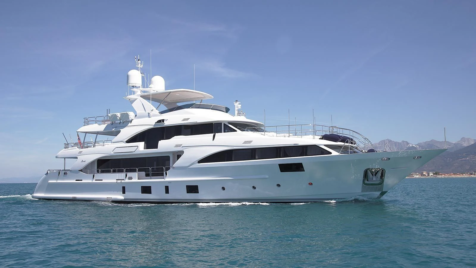 a white yacht in the water aboard LADY LILIAN Yacht for Sale