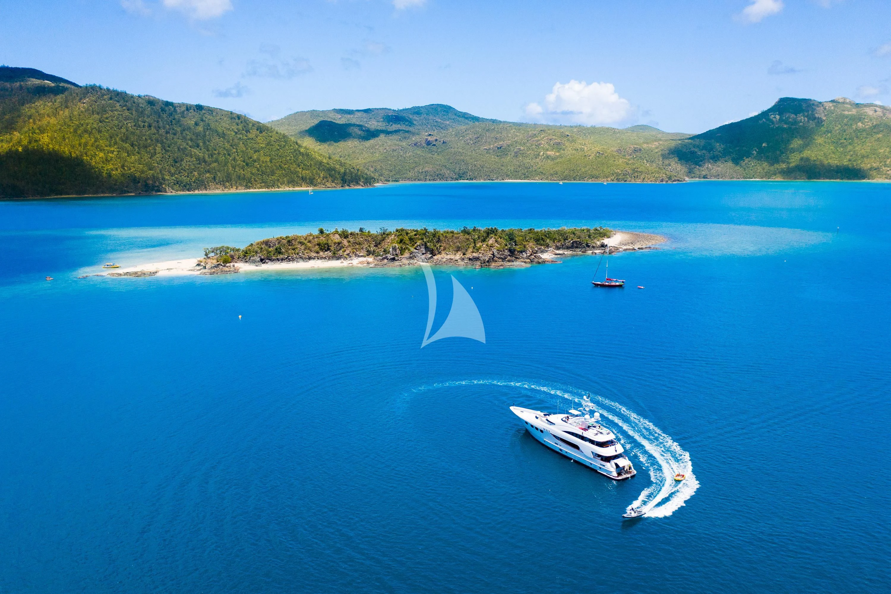a couple of boats sailing in the sea aboard DE LISLE III Yacht for Sale