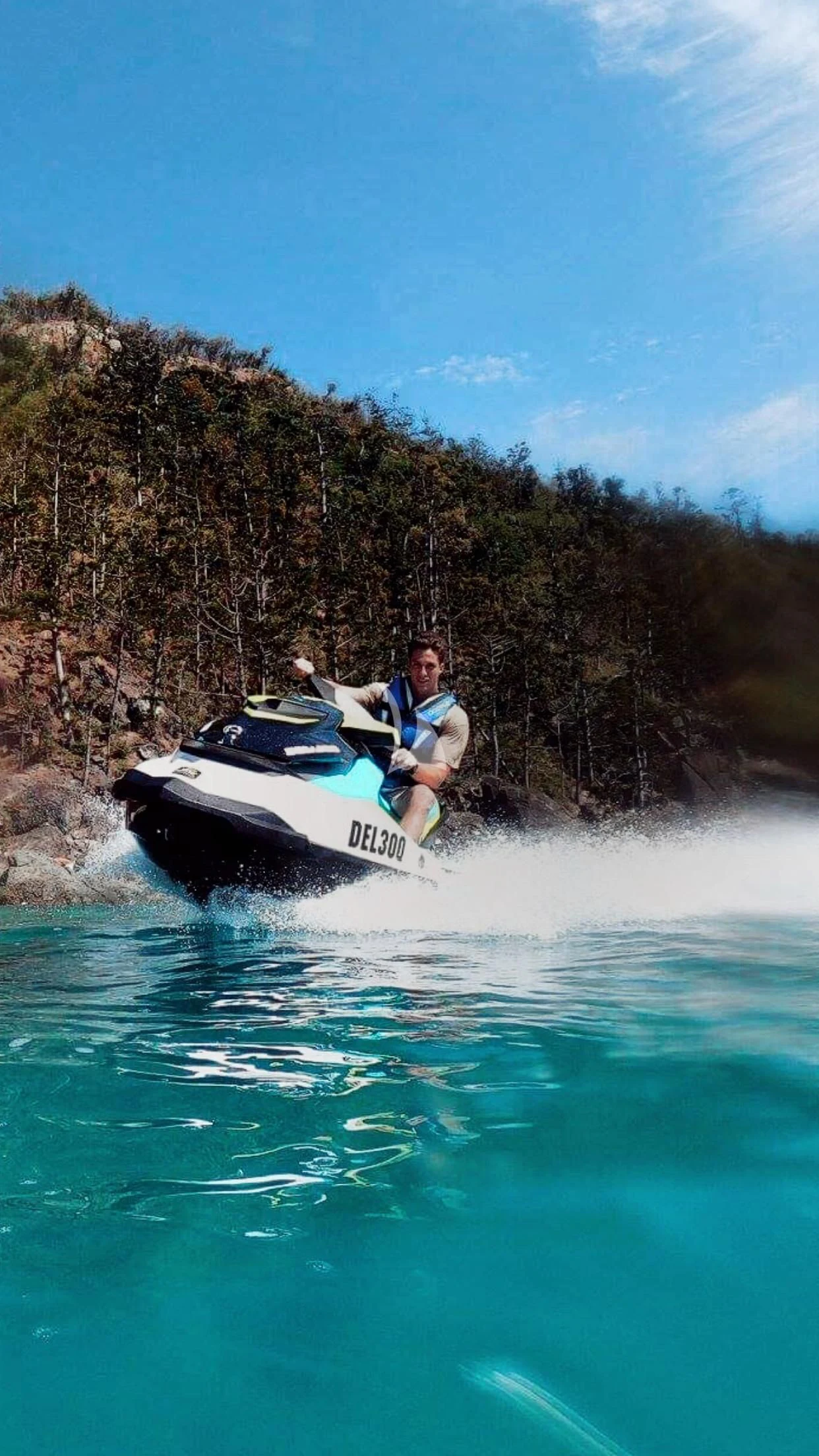 a man on a jet ski aboard DE LISLE III Yacht for Sale