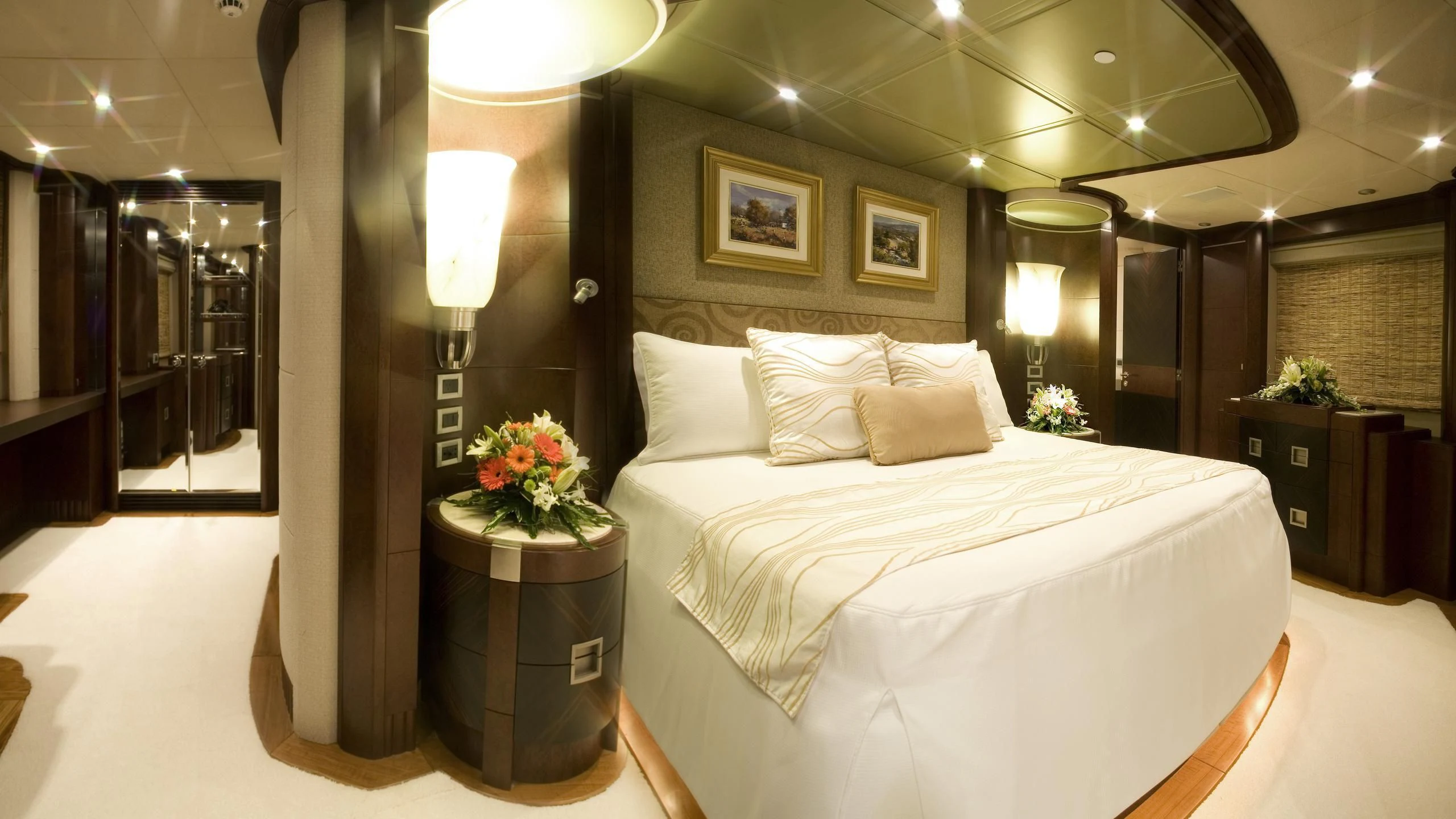 a large bed in a hotel room aboard DE LISLE III Yacht for Sale