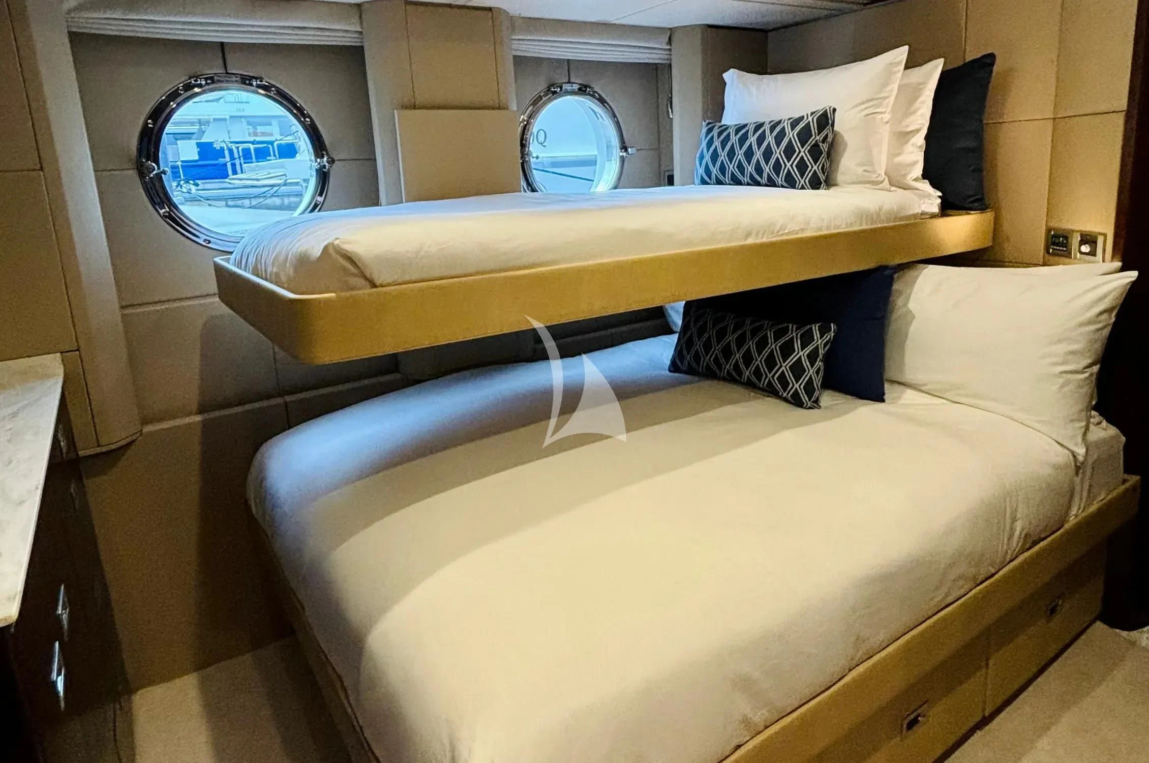 a bed with white sheets aboard DE LISLE III Yacht for Sale