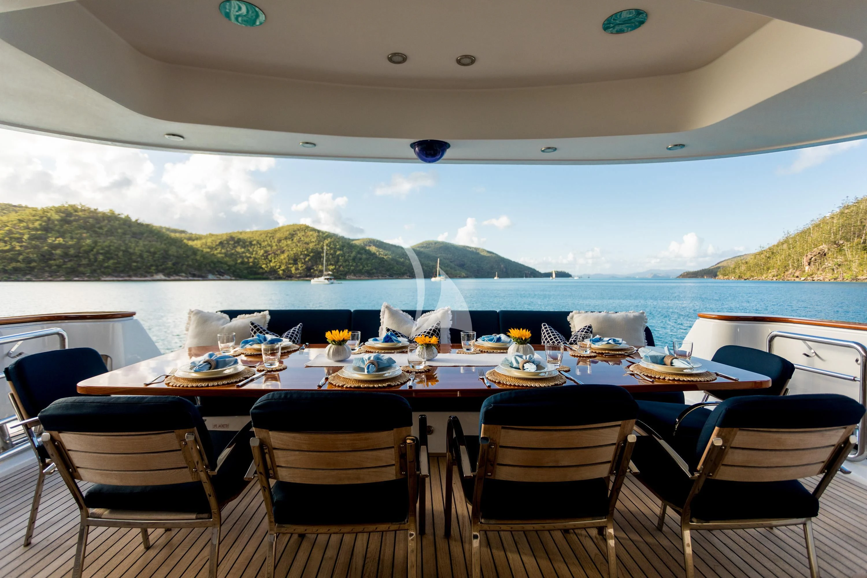a table set for a meal on a boat aboard DE LISLE III Yacht for Sale