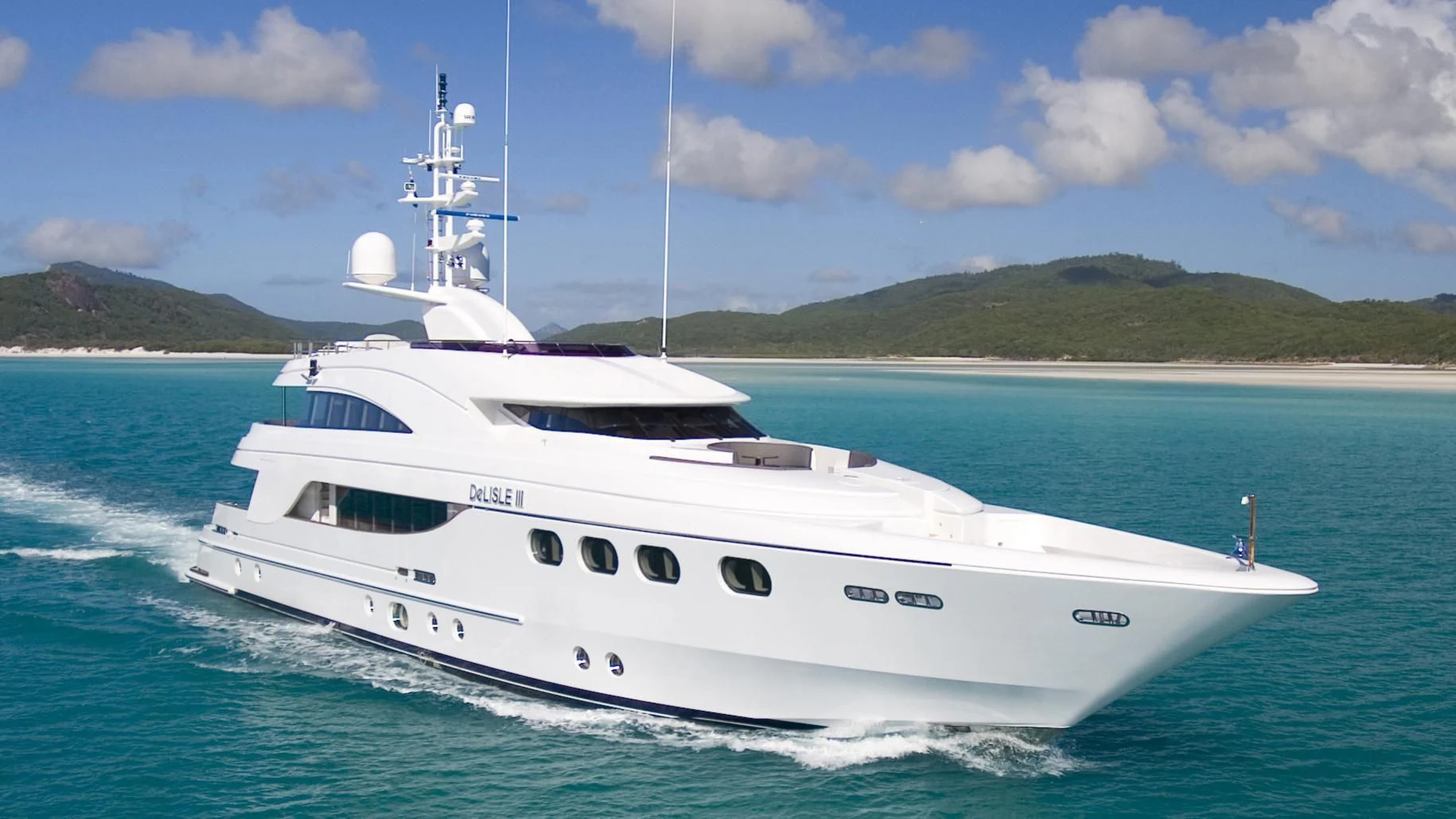a white yacht on the water aboard DE LISLE III Yacht for Sale