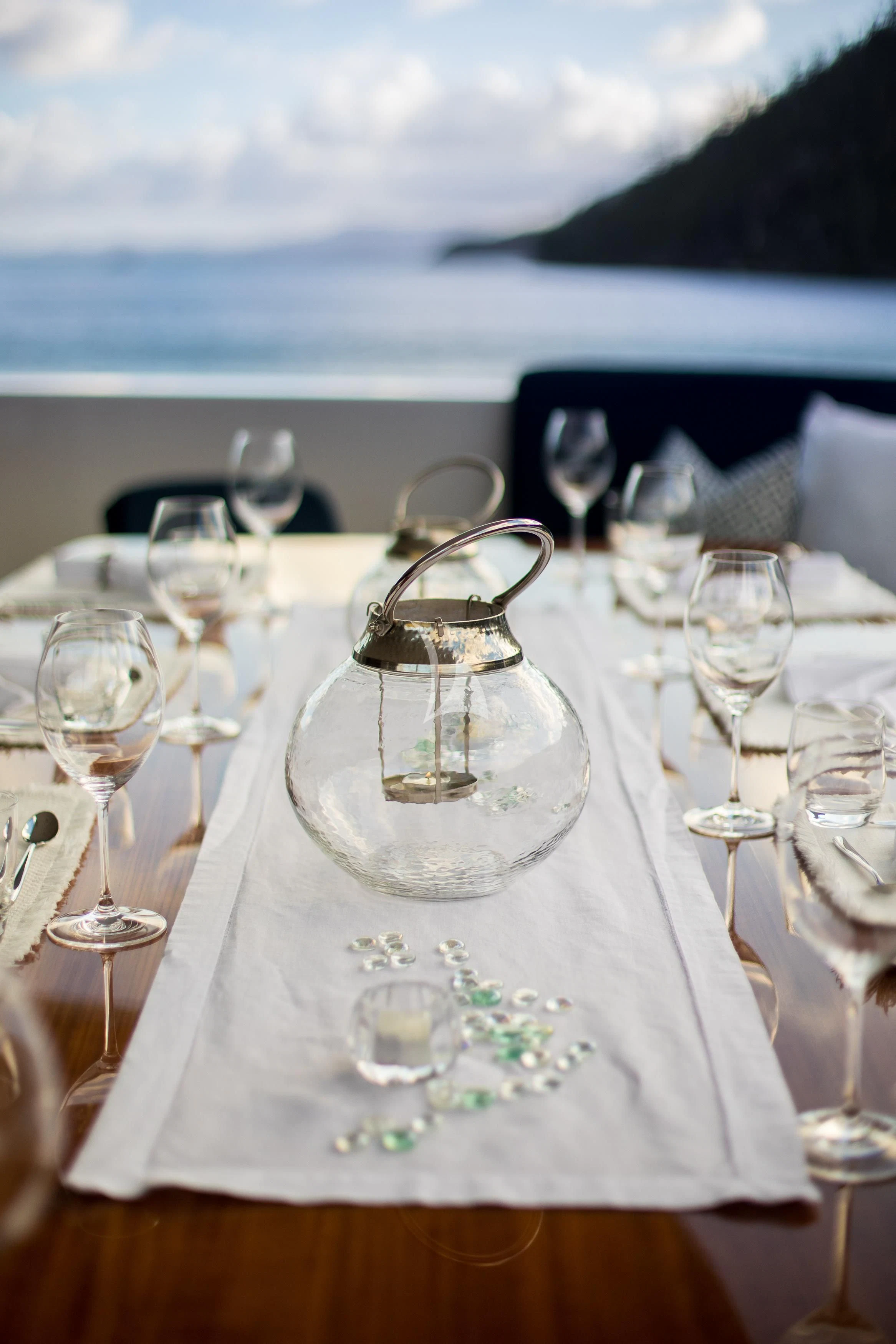 a table with wine glasses aboard DE LISLE III Yacht for Sale