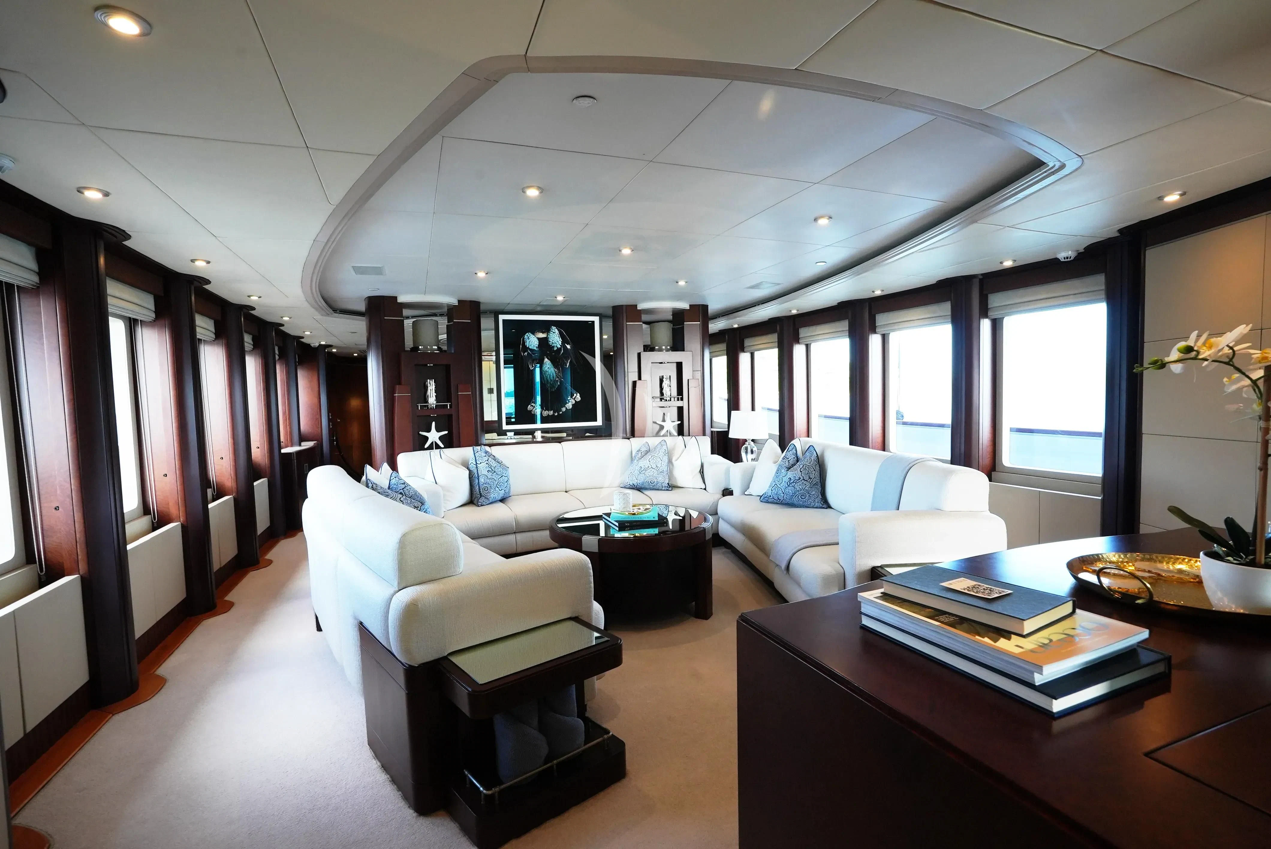 a living room with a large window aboard DE LISLE III Yacht for Sale