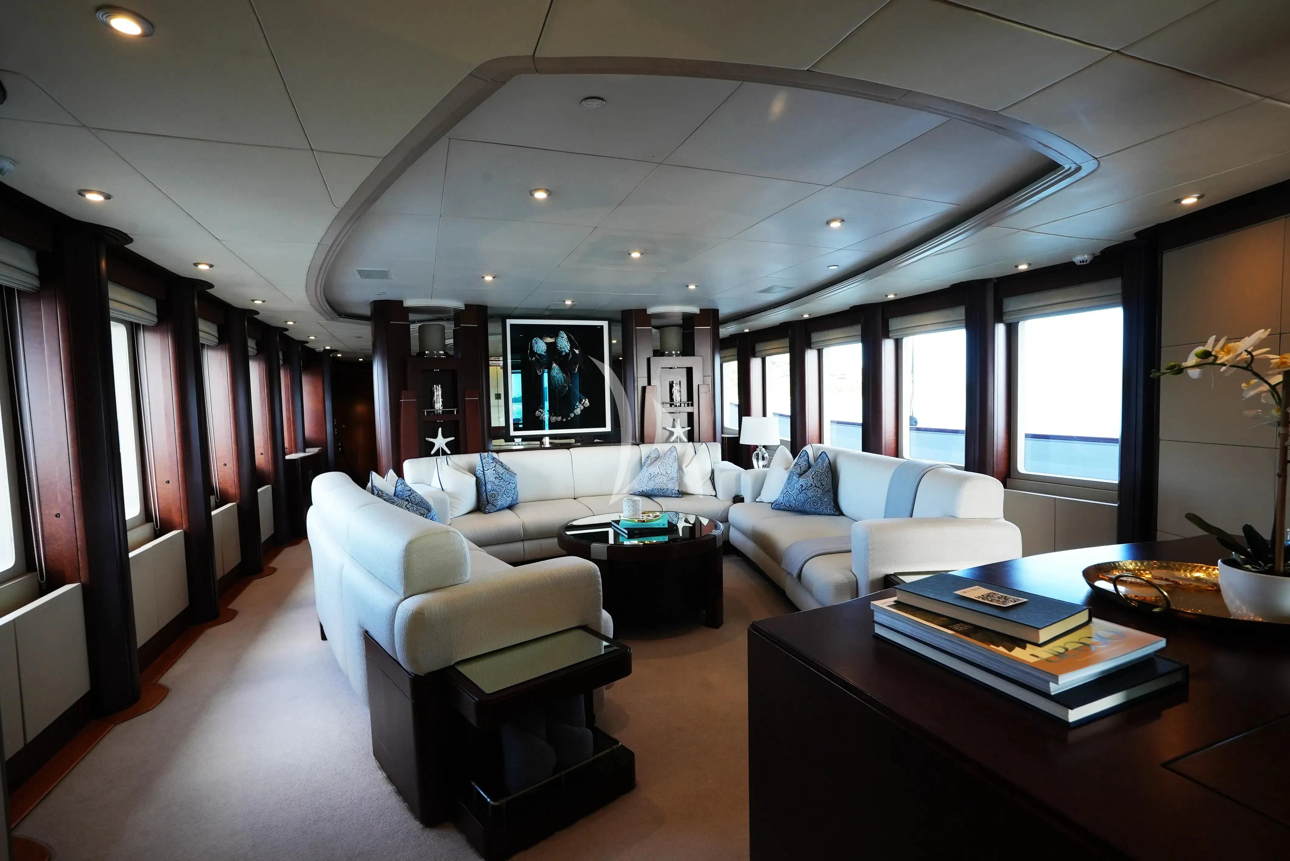 a living room with a large window aboard DE LISLE III Yacht for Sale