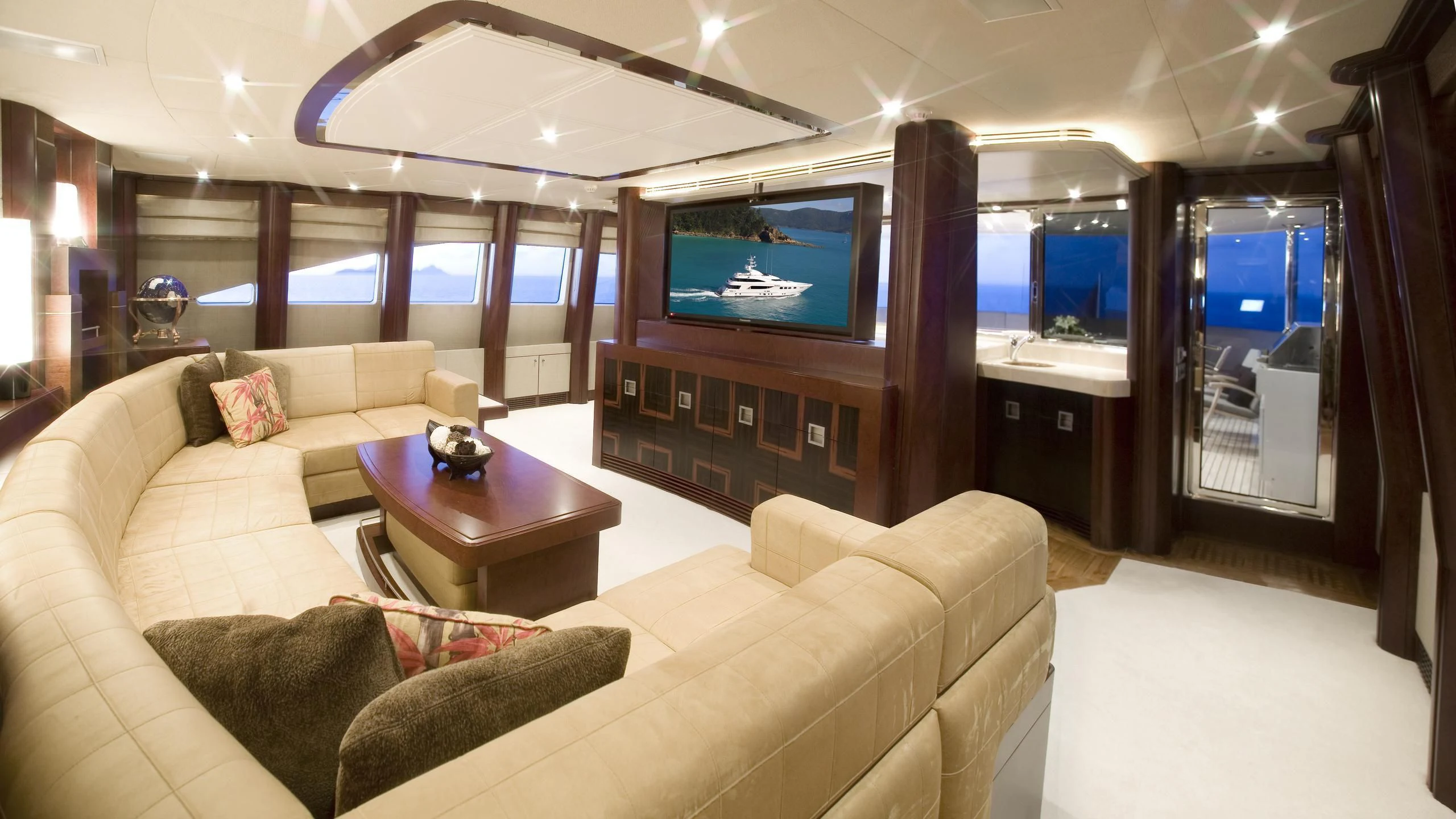 a living room with a large television aboard DE LISLE III Yacht for Sale