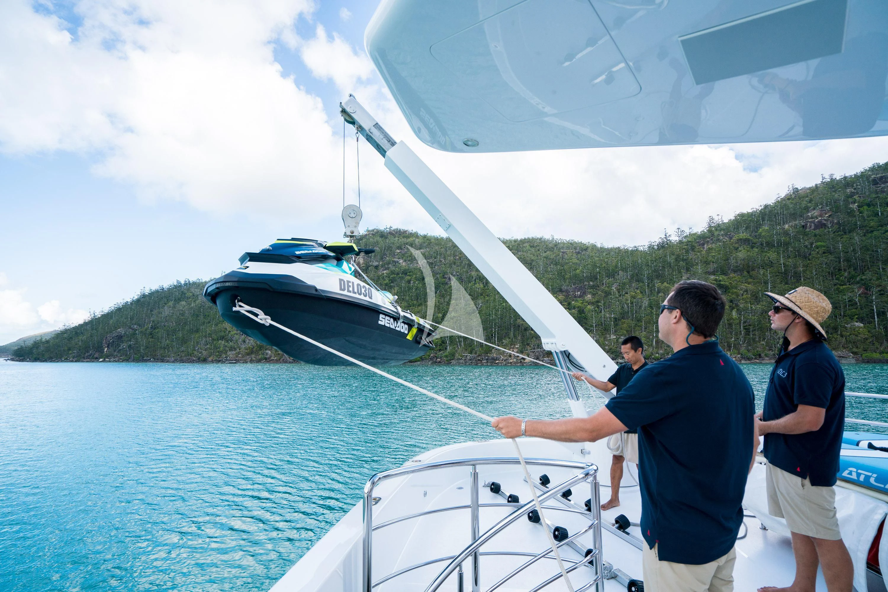 a group of people on a boat aboard DE LISLE III Yacht for Sale