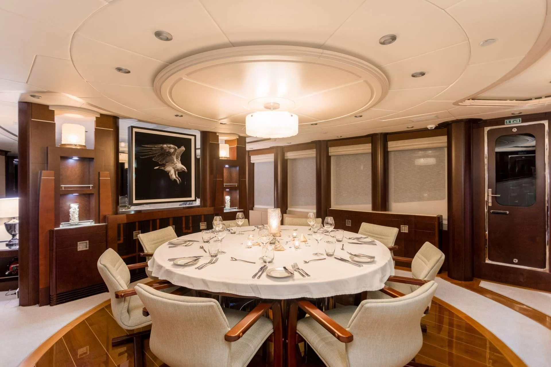 a large dining table in a room aboard DE LISLE III Yacht for Sale