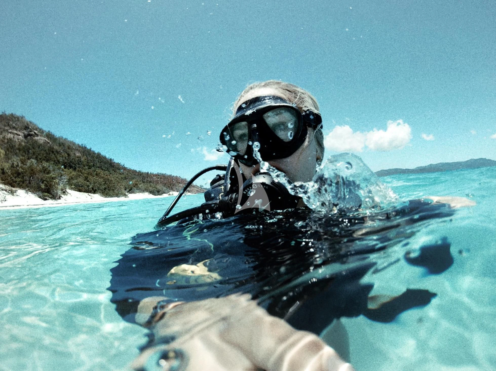 a person in a scuba gear in the water aboard DE LISLE III Yacht for Sale