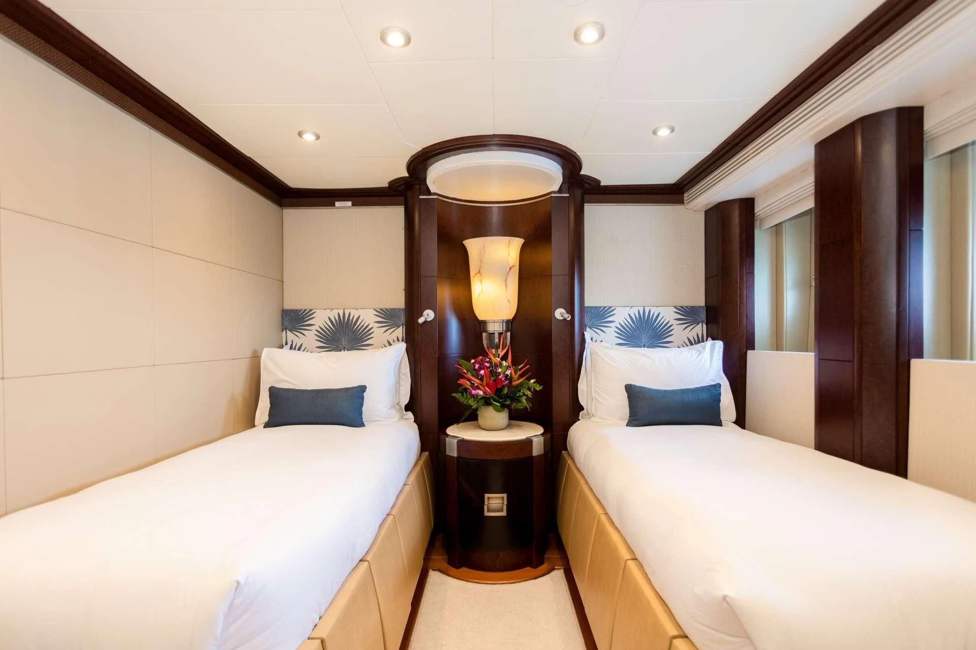 a room with two beds aboard DE LISLE III Yacht for Sale