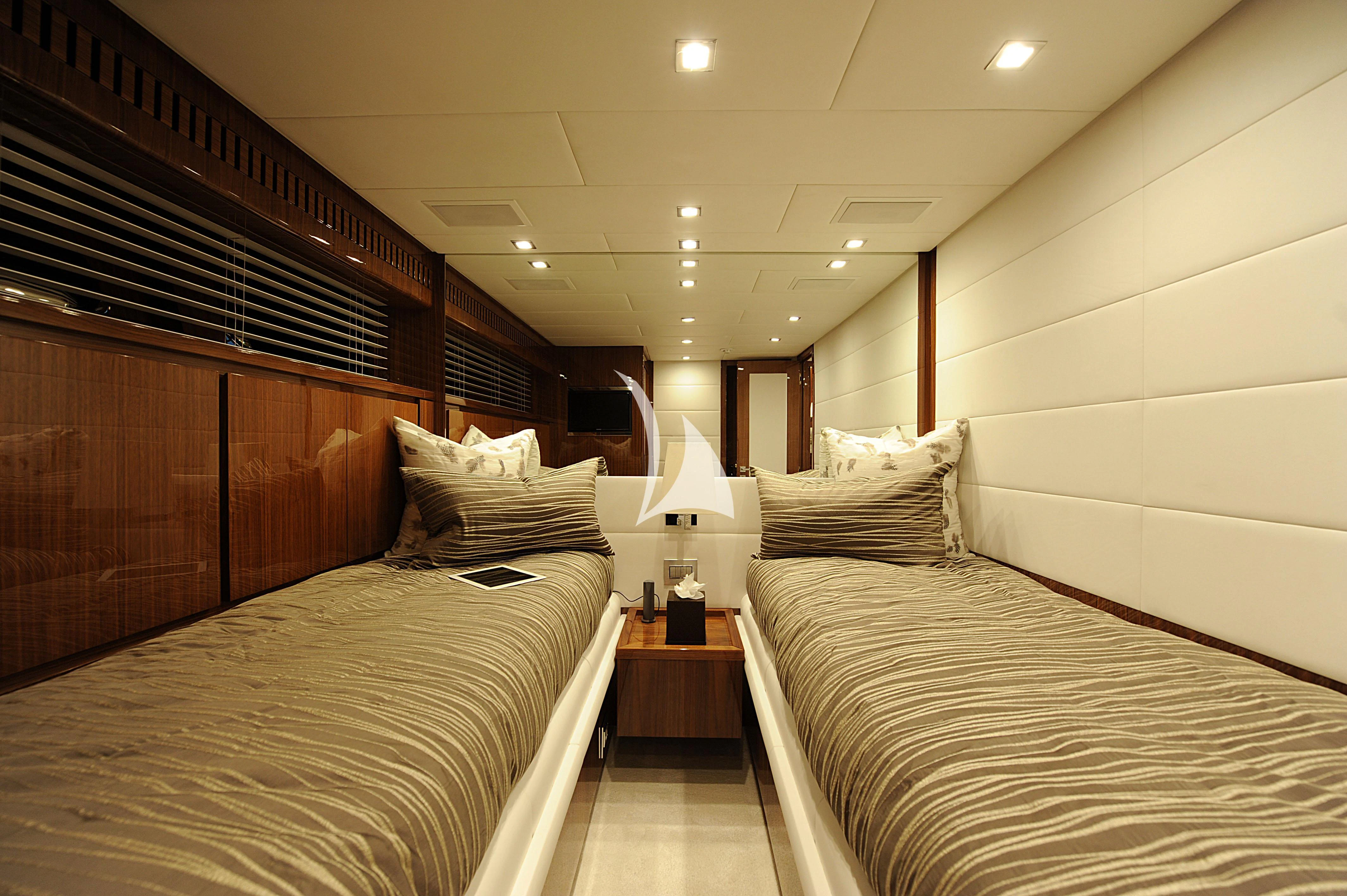 a room with two beds aboard PHOENICIAN Yacht for Sale