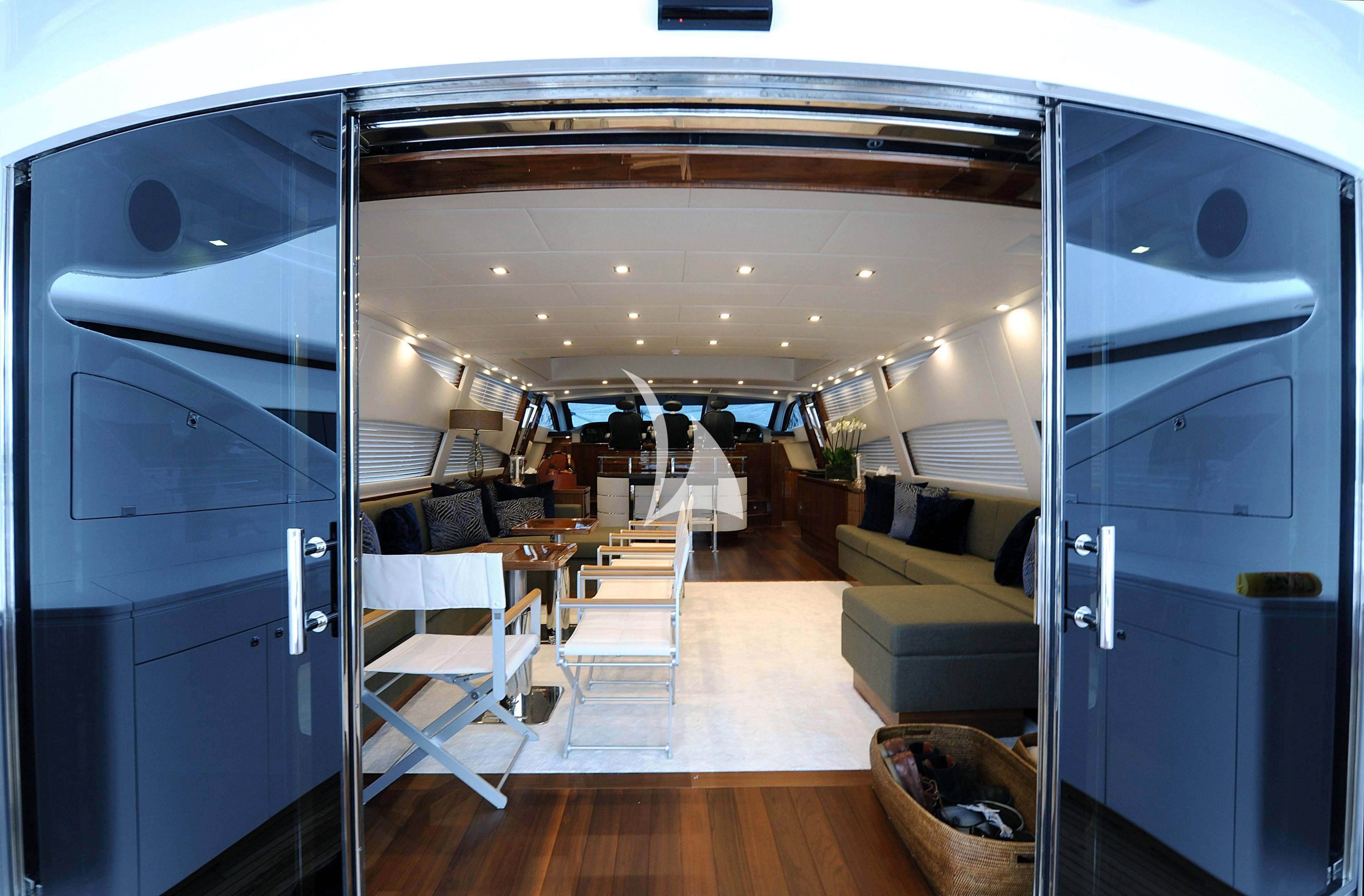 a room with a large mirror aboard PHOENICIAN Yacht for Sale