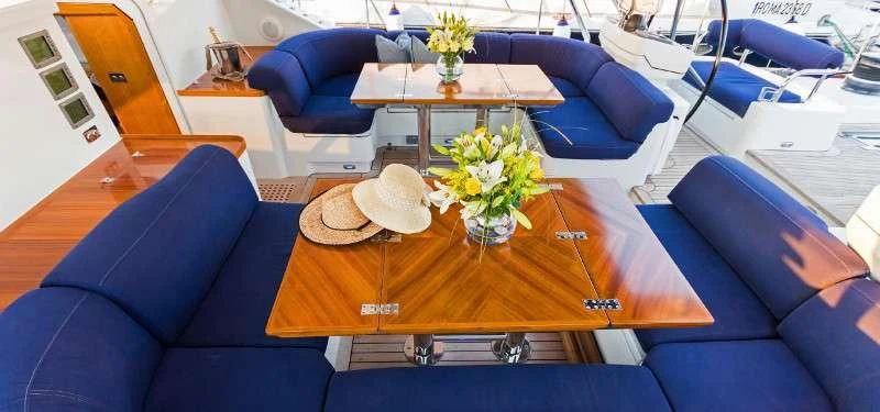 a room with a table and chairs aboard MARGARET ANN Yacht for Sale