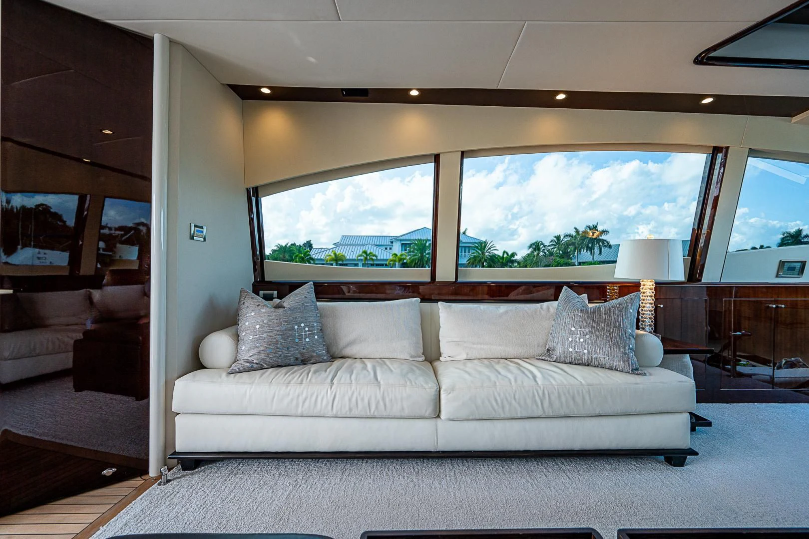 a living room with a large window aboard LATITUDE Yacht for Sale