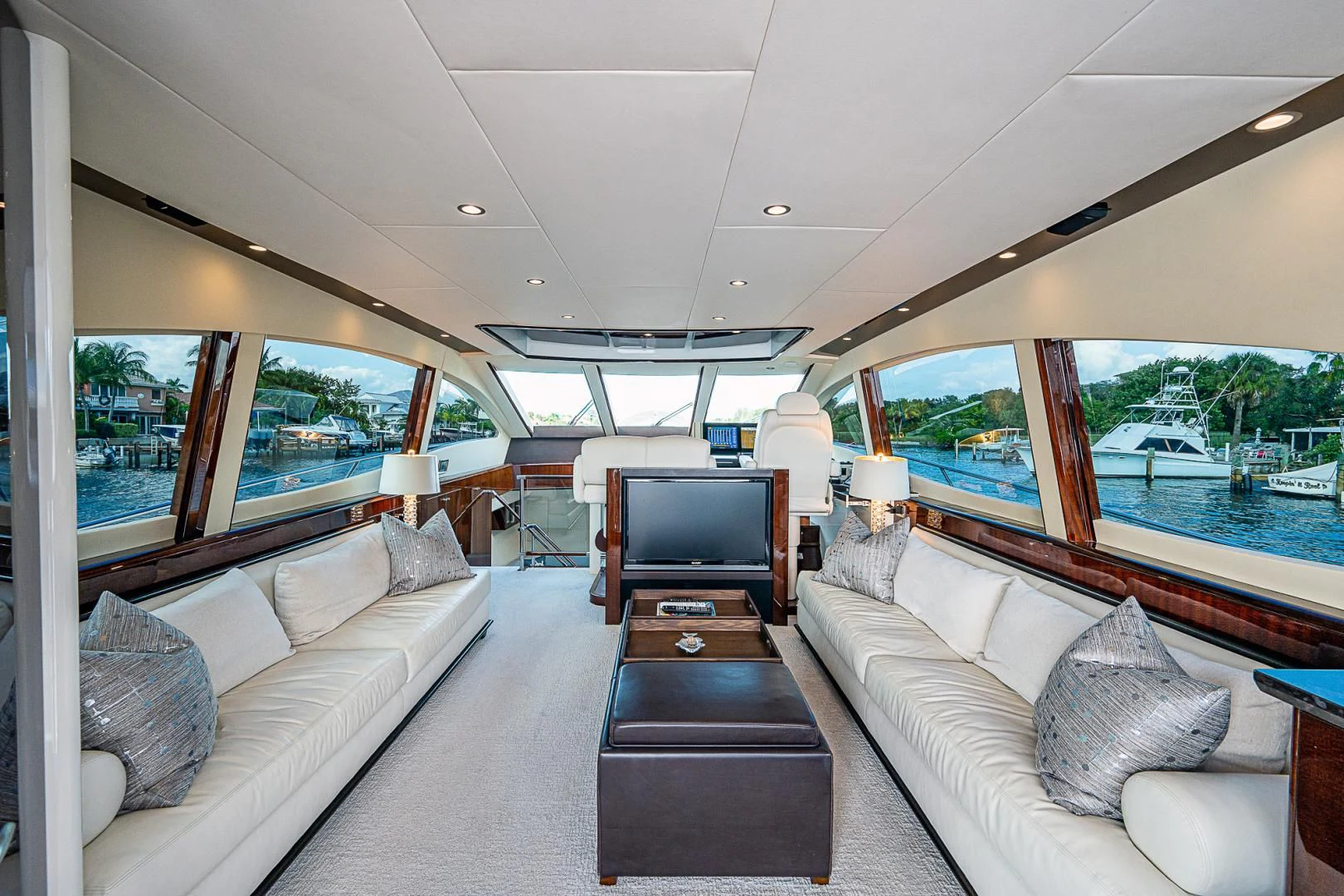 a living room with a large window aboard LATITUDE Yacht for Sale