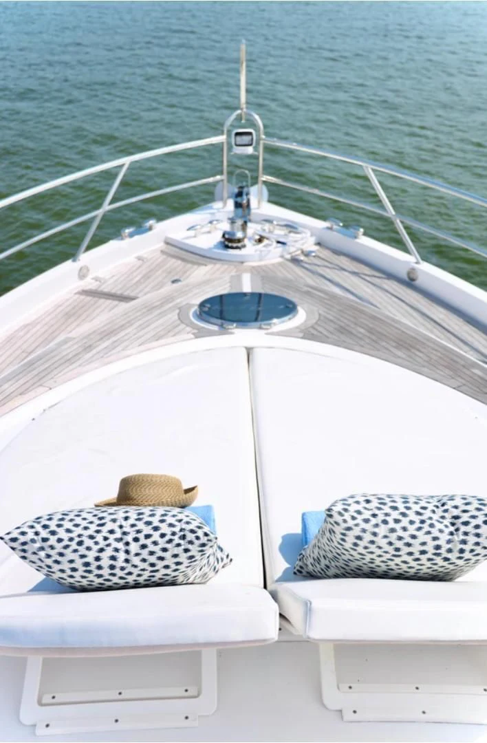 a boat with a hat on it aboard LATITUDE Yacht for Sale