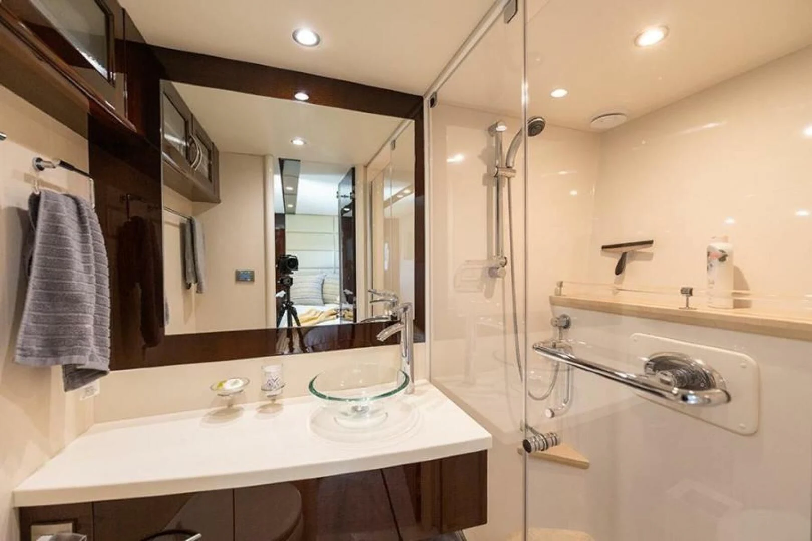 a bathroom with a large mirror aboard LATITUDE Yacht for Sale