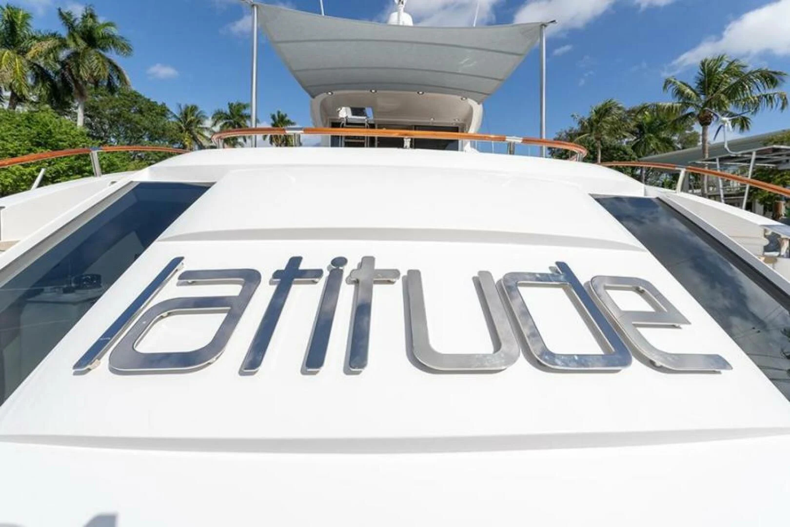 a white car with a word on it aboard LATITUDE Yacht for Sale
