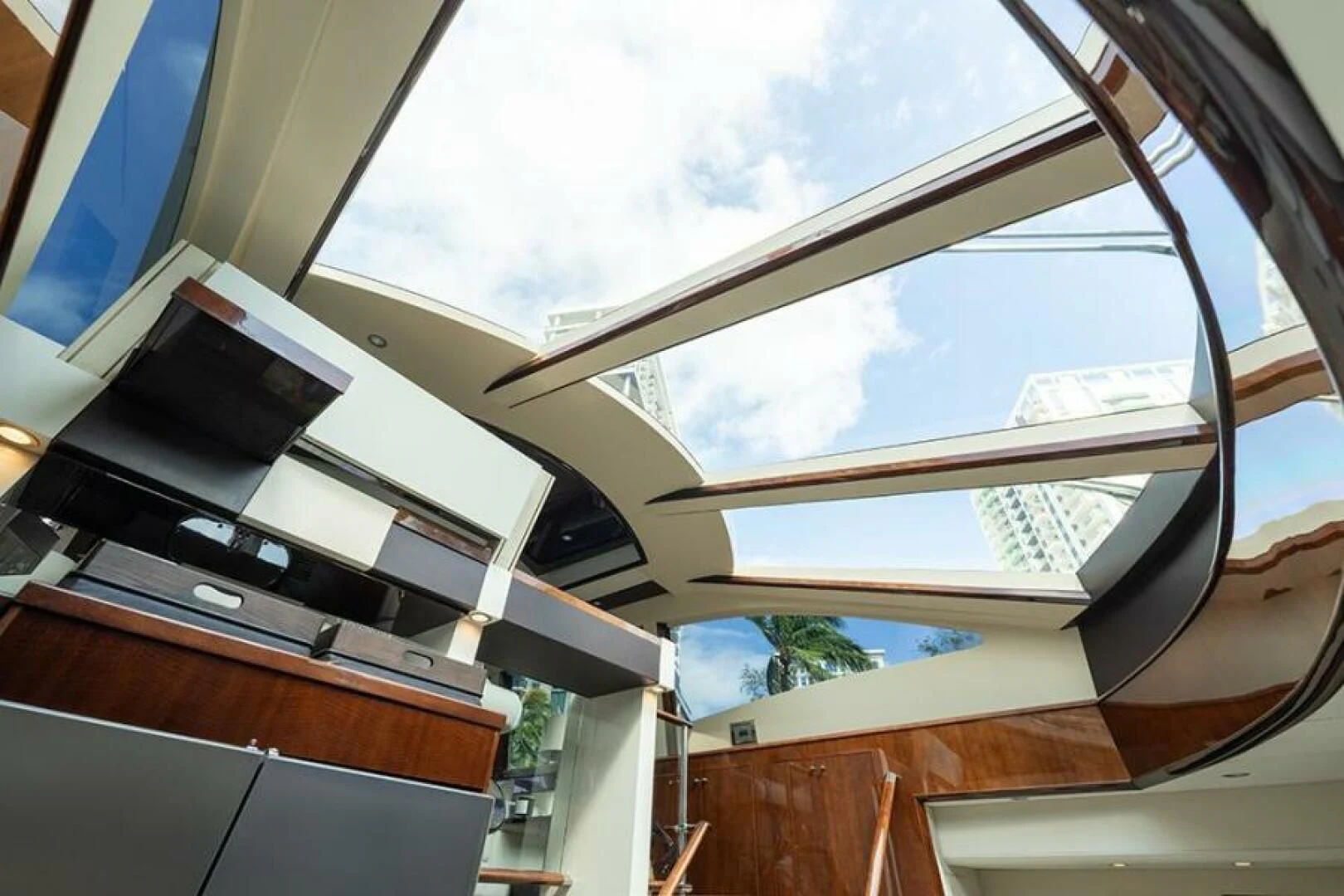 a kitchen with a large window aboard LATITUDE Yacht for Sale