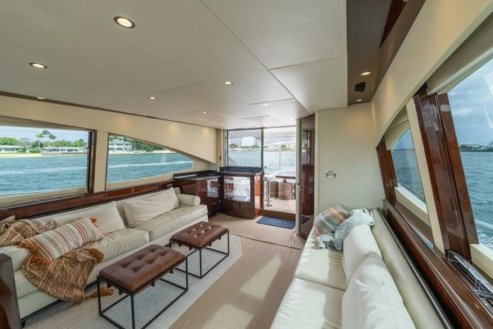 a living room with a large window aboard LATITUDE Yacht for Sale