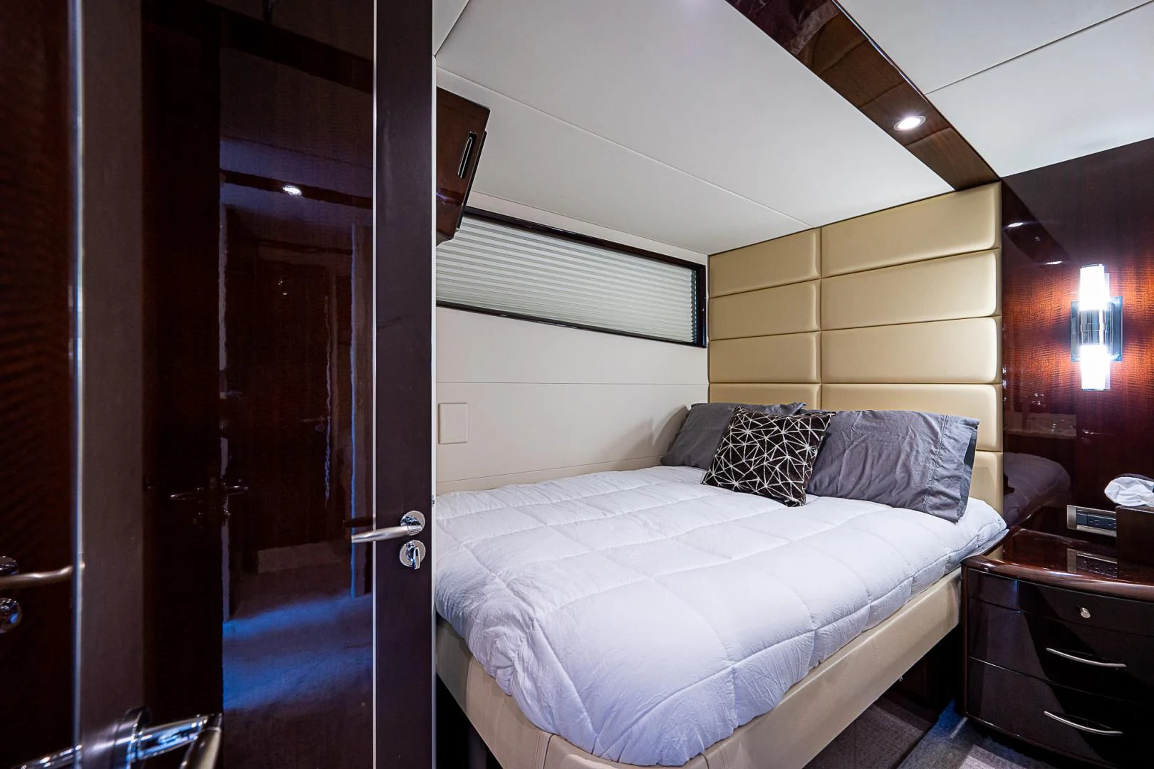 a bed in a room aboard LATITUDE Yacht for Sale