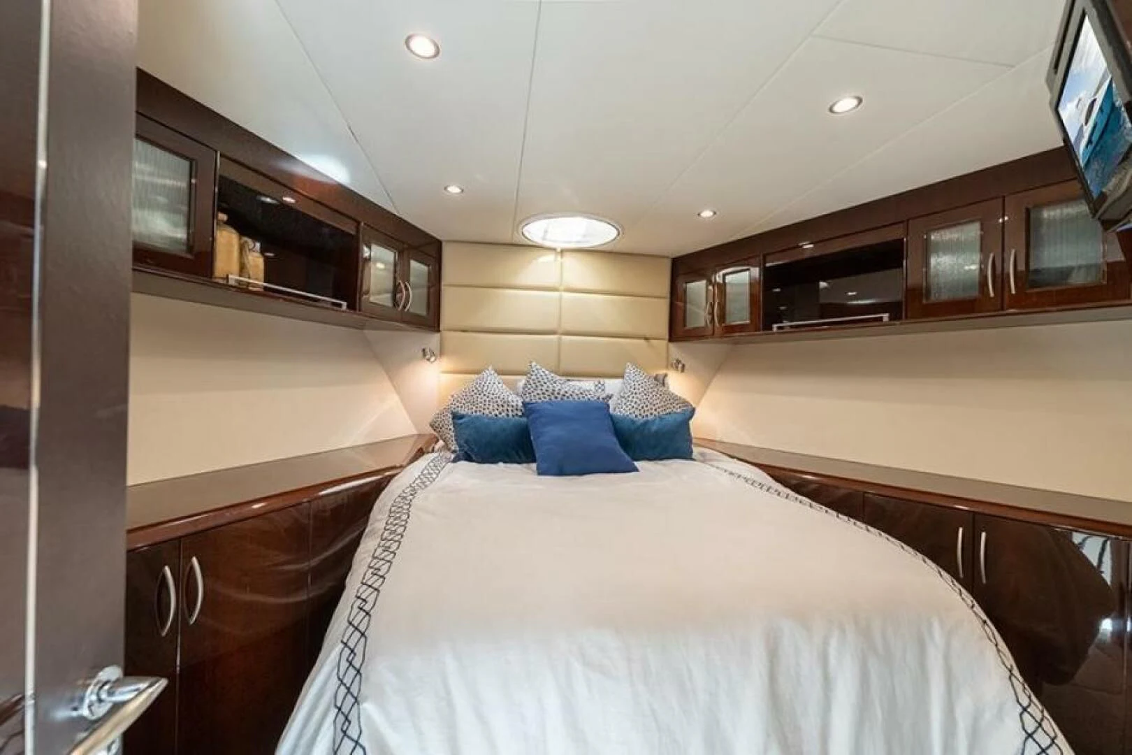 a large bedroom with a large bed aboard LATITUDE Yacht for Sale